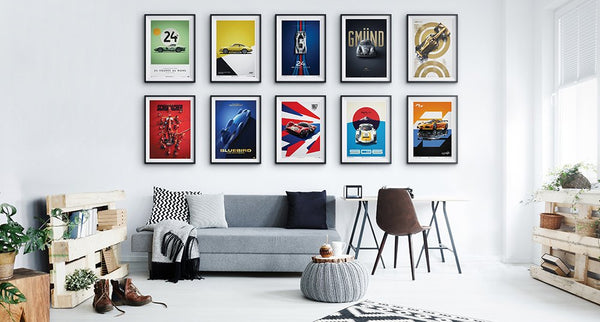 A living room with a selection of posters on the wall by Automobilist