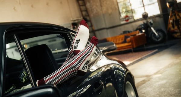 A pair of RECARO sock with a Porsche 911 